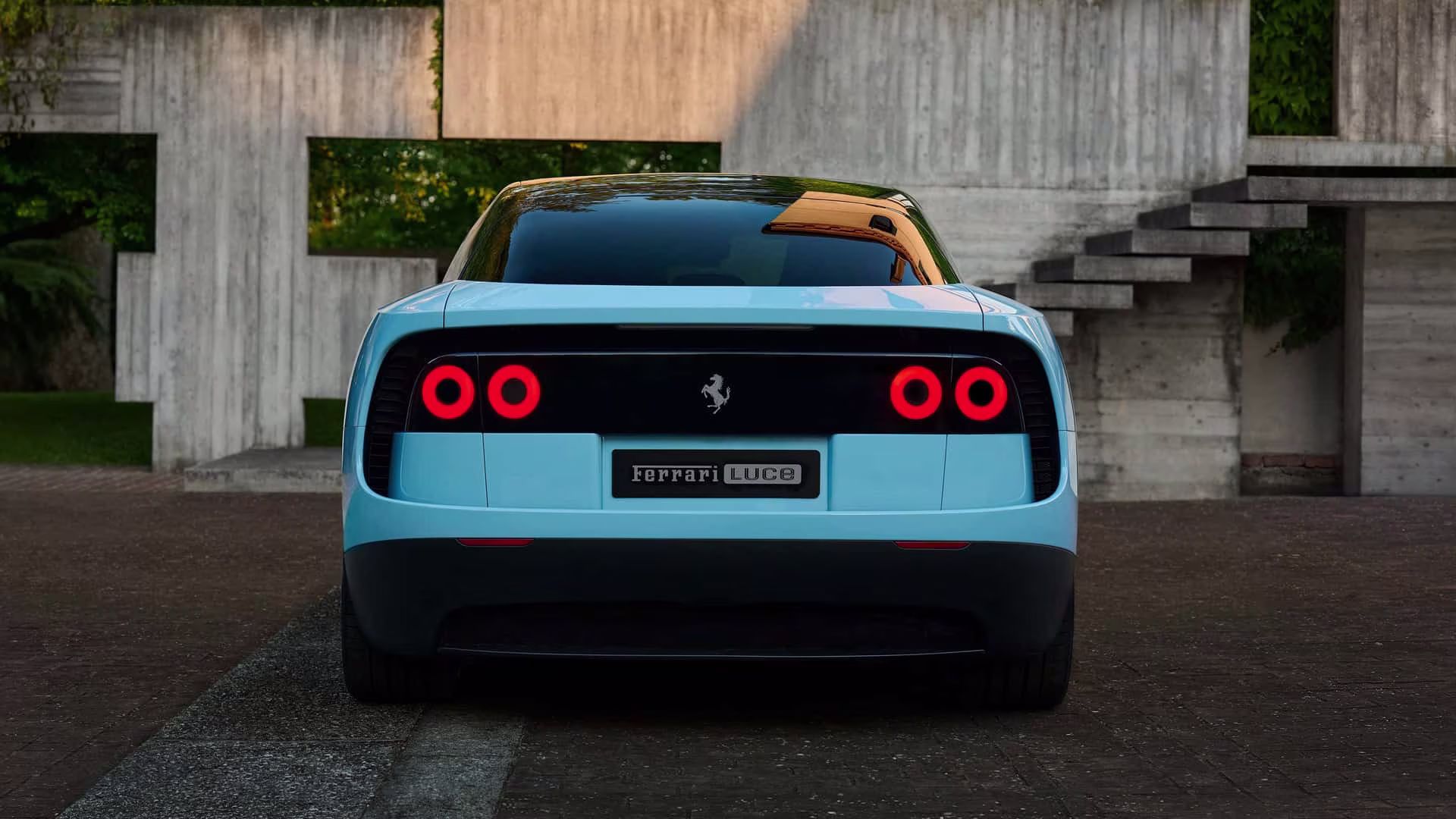 Traseira da Ferrari Luce azul destacando as quatro lanternas redondas clássicas