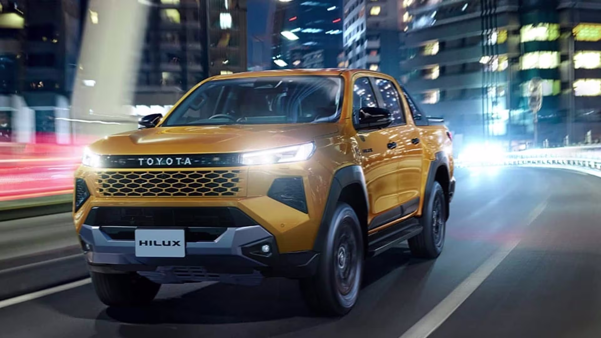 Dianteira amarela da nova Toyota Hilux 2027 com visual Cyber SUMO