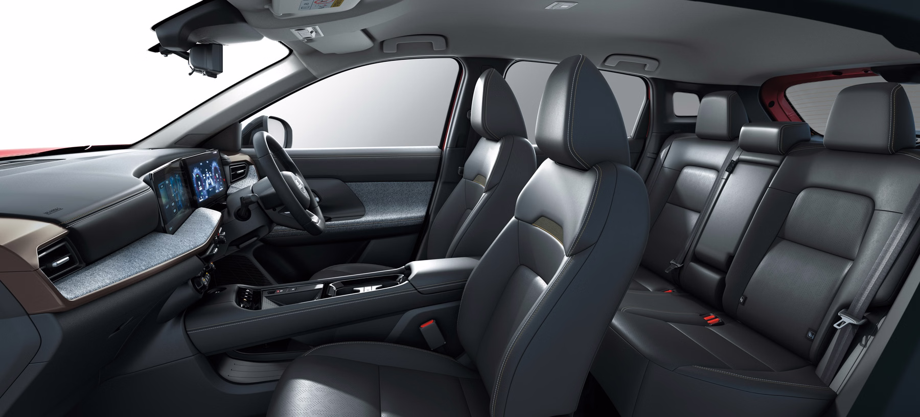 Interior do novo Nissan Kicks com bancos escuros e cabine ampla