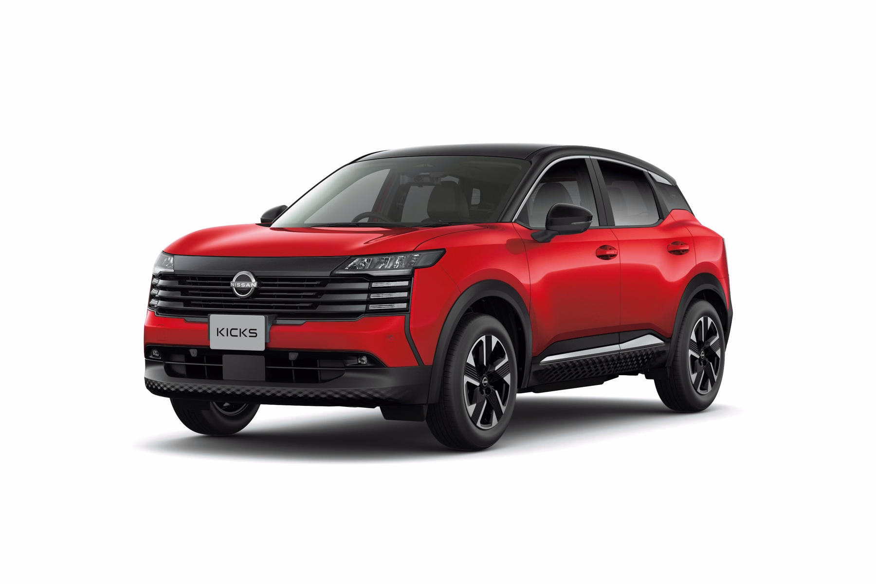 Novo Nissan Kicks vermelho em estúdio em vista de três quartos dianteira