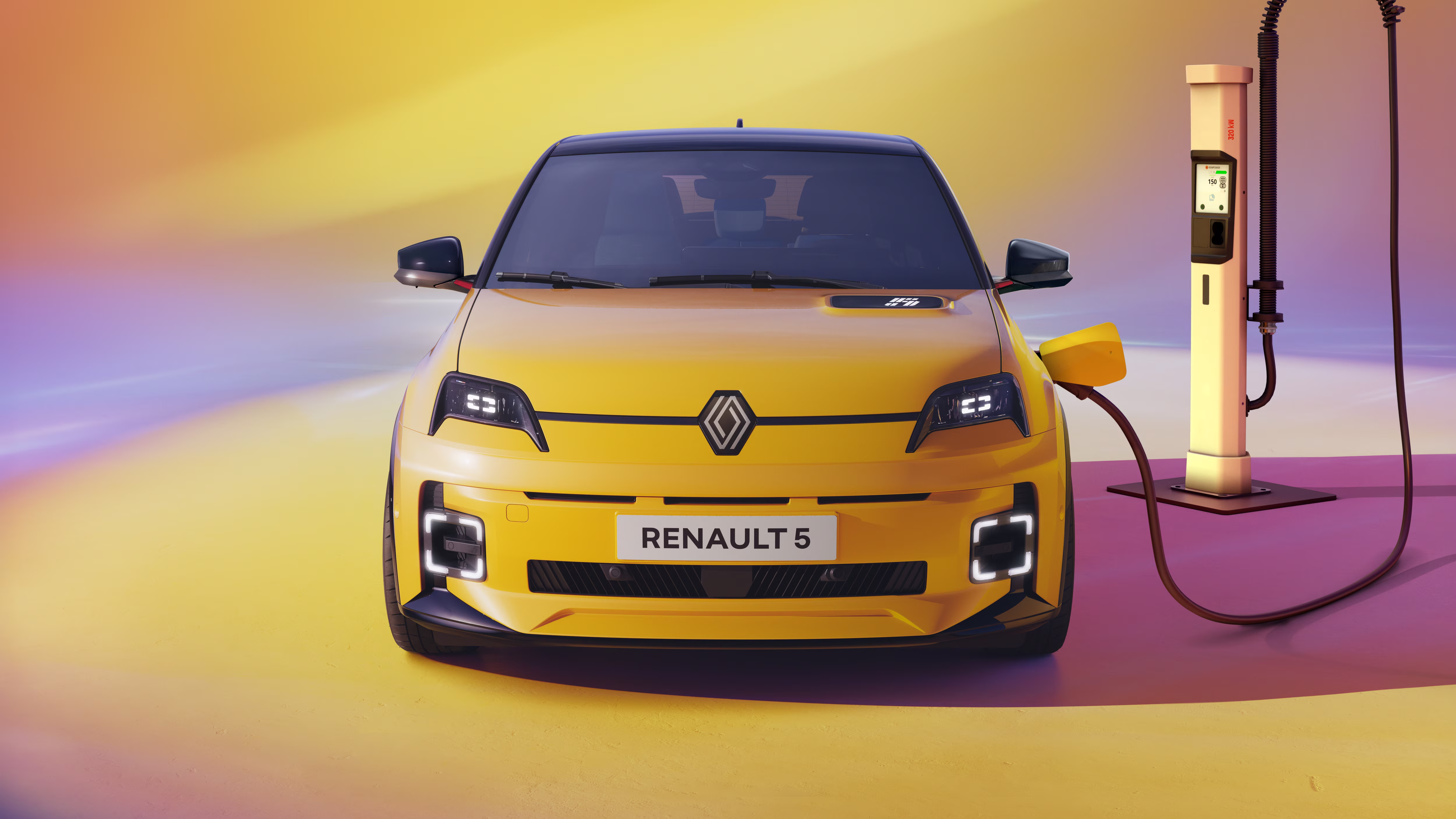 Renault 5 E-Tech electric amarelo conectado a um carregador