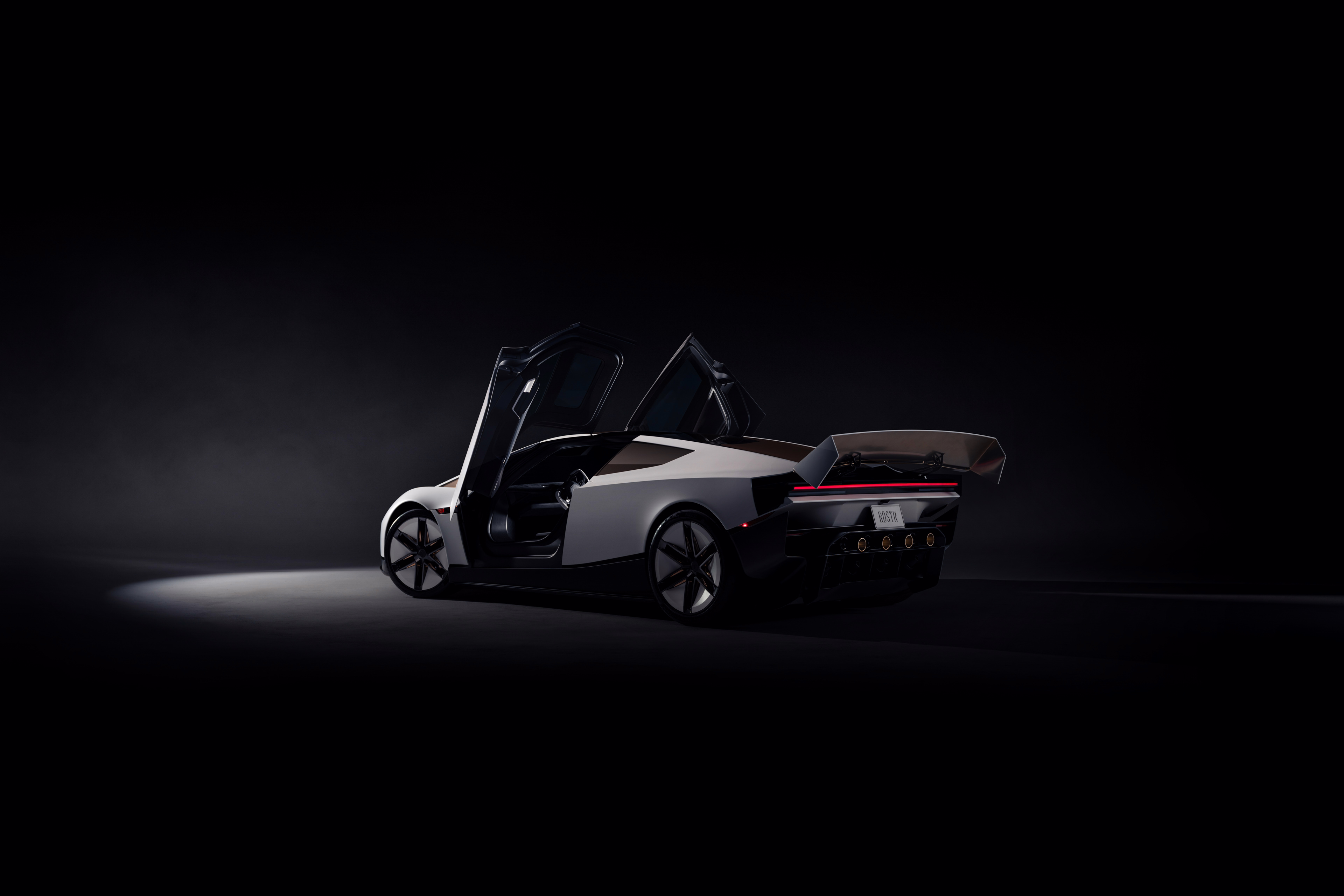 Tesla Roadster em três quartos traseiros com as portas elevadas
