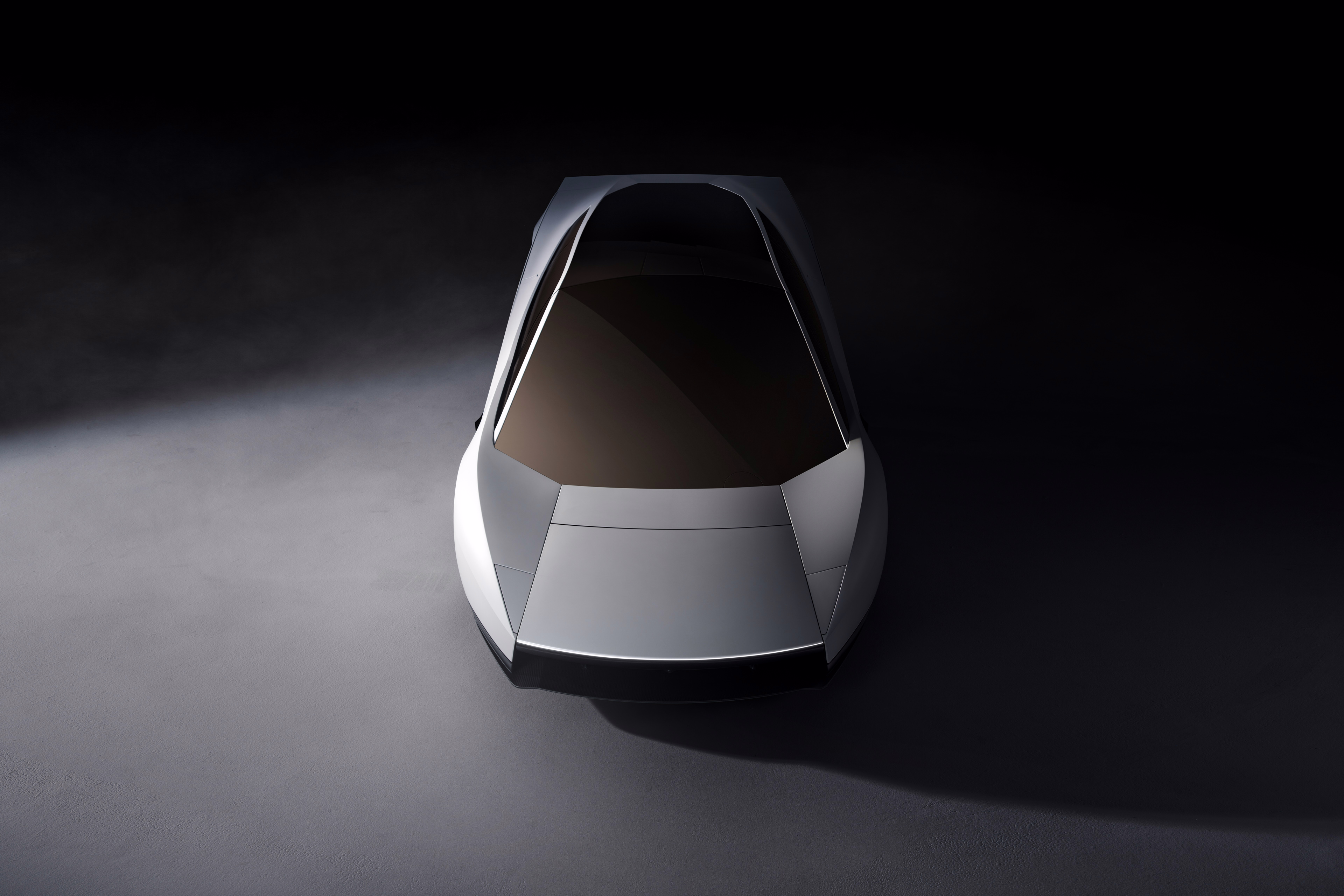 Tesla Roadster visto do alto pela dianteira com portas fechadas